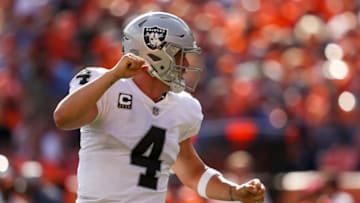 DENVER, CO - SEPTEMBER 16: Quarterback Derek Carr #4 of the Oakland Raiders celebrates after a second quarter touchdown against the Denver Broncos at Broncos Stadium at Mile High on September 16, 2018 in Denver, Colorado. (Photo by Matthew Stockman/Getty Images)