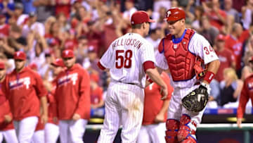Sep 17, 2016; Philadelphia, PA, USA; Philadelphia Phillies starting pitcher Jeremy Hellickson (58) celebrates with catcher A.J. Ellis (34) after pitching a complete game three hit shutout against the Miami Marlins at Citizens Bank Park. The Phillies defeated the Marlins, 8-0. Mandatory Credit: Eric Hartline-USA TODAY Sports