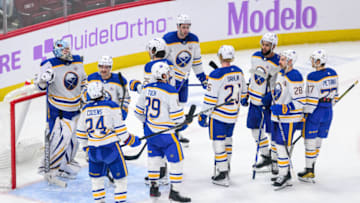 Nov 19, 2023; Chicago, Illinois, USA; Buffalo Sabres players celebrate their win against the Chicago Blackhawks after the game at the United Center. Mandatory Credit: Daniel Bartel-USA TODAY Sports