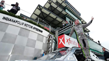 INDIANAPOLIS, IN - SEPTEMBER 10: Justin Allgaier, driver of the #7 Dove Men Care Chevrolet, celebrates in victory lane after winning the NASCAR Xfinity Series Lilly Diabetes 250 at Indianapolis Motor Speedway on September 10, 2018 in Indianapolis, Indiana. (Photo by Sean Gardner/Getty Images)