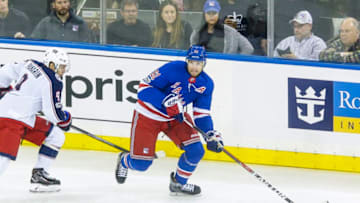 NEW YORK, NY - NOVEMBER 6: New York Rangers right wing Rick Nash (61) looks to pass as Columbus Blue Jackets left wing Artemi Panarin (9) closes in during the Columbus Blue Jackets and New York Rangers NHL game on November 6, 2017, at Madison Square Garden in New York, NY. (Photo by John Crouch/Icon Sportswire via Getty Images)