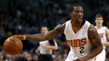 Mar 14, 2014; Boston, MA, USA; Phoenix Suns guard Eric Bledsoe (2) dribbles the ball against the Boston Celtics during the first half at TD Garden. Mandatory Credit: Mark L. Baer-USA TODAY Sports