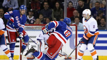 NEW YORK, NEW YORK - SEPTEMBER 24: Jacob Trouba #8 of the New York Rangers fires a shot against the New York Islanders during the first period at Madison Square Garden on September 24, 2019 in New York City. (Photo by Bruce Bennett/Getty Images)