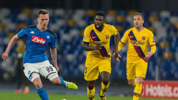Arkadiusz Milik of SSC Napoli and Samuel Umtiti of FC Barcelona. (Photo by Harry Langer/DeFodi Images via Getty Images)