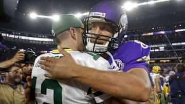 Sep 18, 2016; Minneapolis, MN, USA; Minnesota Vikings quarterback Sam Bradford (8) hugs Green Bay Packers quarterback Aaron Rodgers (12) after the game at U.S. Bank Stadium. The Vikings win 17-14. Mandatory Credit: Bruce Kluckhohn-USA TODAY Sports
