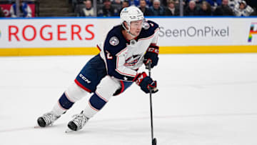 Apr 4, 2023; Toronto, Ontario, CAN; Columbus Blue Jackets defenseman Andrew Peeke (2) carries the puck against the Toronto Maple Leafs at Scotiabank Arena. Mandatory Credit: John E. Sokolowski-USA TODAY Sports