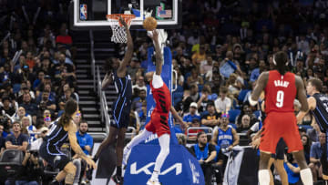 ORLANDO, FLORIDA - MARCH 05: Bol Bol #10 of the Orlando Magic blocks a shot by Cam Reddish #5 of the Portland Trail Blazers during the second half of a game at the Amway Center on March 05, 2023 in Orlando, Florida. NOTE TO USER: User expressly acknowledges and agrees that, by downloading and or using this photograph, User is consenting to the terms and conditions of the Getty Images License Agreement. (Photo by James Gilbert/Getty Images)