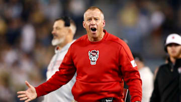 Dave Doeren of the North Carolina State Wolfpack reacts during the first half against the Georgia Tech Yellow Jackets at Bobby Dodd Stadium on November 21, 2019 in Atlanta, Georgia. (Photo by Todd Kirkland/Getty Images)