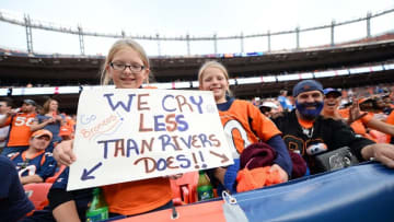 Oct 30, 2016; Denver, CO, USA; Denver Broncos fans hold a sign in reference to San Diego Chargers quarterback Philip Rivers (17) (not pictured) in the second half at Sports Authority Field at Mile High. Mandatory Credit: Ron Chenoy-USA TODAY Sports