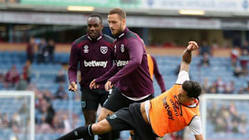 BURNLEY, ENGLAND - OCTOBER 14: Jose Fonte of West Ham United tackles Marko Arnautovic of West Ham United during the warm up prior to the Premier League match between Burnley and West Ham United at Turf Moor on October 14, 2017 in Burnley, England. (Photo by Ian MacNicol/Getty Images)