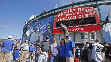Sep 26, 2015; Chicago, IL, USA; Chicago Cubs fans pose for a picture in front of the Ernie Banks statue before the game between the Chicago Cubs and Pittsburgh Pirates at Wrigley Field. Mandatory Credit: Kamil Krzaczynski-USA TODAY Sports