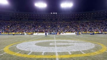 Nov 30, 2014; Green Bay, WI, USA; The Green Bay Packers logo at midfield of Lambeau Field following the game between the New England Patriots and Green Bay Packers. Green Bay won 26-21. Mandatory Credit: Jeff Hanisch-USA TODAY Sports