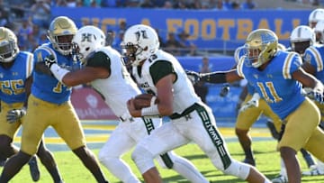 PASADENA, CA - SEPTEMBER 09: Cole Brownholtz #17 of the Hawaii Warriors gets pas Keisean Lucier-South #11 of the UCLA Bruins as he runs for a touch down in the fourth quarter of the game at the Rose Bowl on September 9, 2017 in Pasadena, California. (Photo by Jayne Kamin-Oncea/Getty Images)