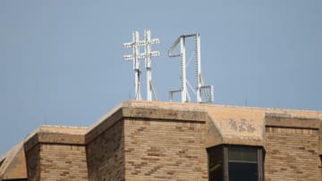 The 8 foot tall number one sign that sits on top of Grace Hall at the University of Notre Dame. Photo Credit: Julie Hauenstein