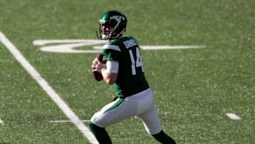 Nov 29, 2020; East Rutherford, New Jersey, USA; New York Jets quarterback Sam Darnold (14) drops back to pass against the Miami Dolphins during the first half at MetLife Stadium. Mandatory Credit: Vincent Carchietta-USA TODAY Sports