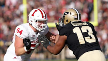 Coy Cronk of Indiana blocks Gelen Robinson of Purdue Saturday, November 25, 2017, at Ross-Ade Stadium.Laf Indiana At Purdue