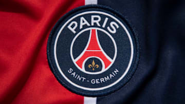 MANCHESTER, ENGLAND - AUGUST 13: The Paris Saint-Germain club crest on the first team home shirt on August 13, 2020 in Manchester, United Kingdom. (Photo by Visionhaus)