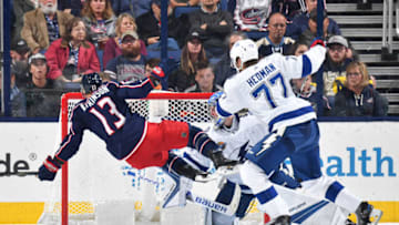 COLUMBUS, OH - OCTOBER 19: Victor Hedman #77 of the Tampa Bay Lightning trips Cam Atkinson #13 of the Columbus Blue Jackets during the second period of a game on October 19, 2017 at Nationwide Arena in Columbus, Ohio. Hedman was given a minor penalty for tripping. (Photo by Jamie Sabau/NHLI via Getty Images)