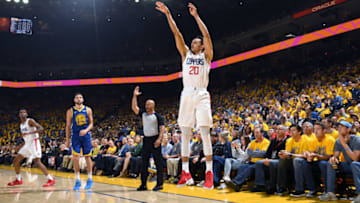 OAKLAND, CA - APRIL 24: Landry Shamet #20 of the LA Clippers shoots the ball against the Golden State Warriors during Game Five of Round One of the 2019 NBA Playoffs on April 24, 2019 at ORACLE Arena in Oakland, California. NOTE TO USER: User expressly acknowledges and agrees that, by downloading and/or using this photograph, user is consenting to the terms and conditions of Getty Images License Agreement. Mandatory Copyright Notice: Copyright 2019 NBAE (Photo by Noah Graham/NBAE via Getty Images)