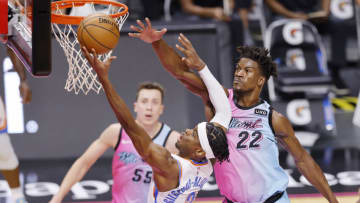 Shai Gilgeous-Alexander #2 of the Oklahoma City Thunder goes up for a layup against Jimmy Butler #22 of the Miami Heat(Photo by Michael Reaves/Getty Images)