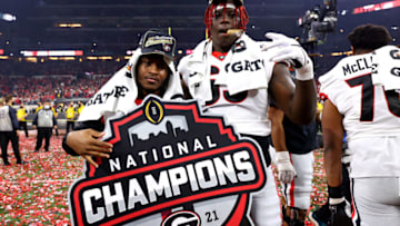 The Georgia Bulldogs celebrate after defeating the Alabama Crimson Tide during the College Football Playoff Championship held at Lucas Oil Stadium on January 10, 2022 in Indianapolis, Indiana. (Photo by Jamie Schwaberow/Getty Images)