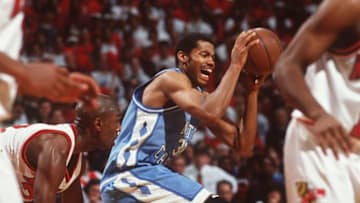 7 FEB 1995: RASHEED WALLACE, CENTER FOR NORTH CAROLINA, GRABS ON TO THE BALL AS JOE SMITH OF MARYLAND DEFENDS DURING MARYLAND''S 86-73 WIN AT COLE FIELDHOUSE IN COLLEGE PARK, MARYLAND. Mandatory Credit: Doug Pensinger/ALLSPORT