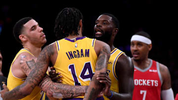 LOS ANGELES, CA - OCTOBER 20: Lonzo Ball #2 and Lance Stephenson #6 of the Los Angeles Lakers restrain Brandon Ingram #14 from Carmelo Anthony #7 of the Houston Rockets during a 124-115 loss to the Houston Rockets at Staples Center on October 20, 2018 in Los Angeles, California. (Photo by Harry How/Getty Images)