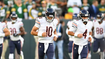 GREEN BAY, WI - SEPTEMBER 09: Mitchell Trubisky #10 and Chase Daniel #4 warm up before a game against the Green Bay Packers at Lambeau Field on September 9, 2018 in Green Bay, Wisconsin. (Photo by Stacy Revere/Getty Images)