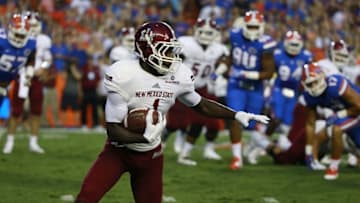 Sep 5, 2015; Gainesville, FL, USA New Mexico State Aggies wide receiver Teldrick Morgan (1) runs with the ball against the Florida Gators during the first quarter at Ben Hill Griffin Stadium. Mandatory Credit: Kim Klement-USA TODAY Sports
