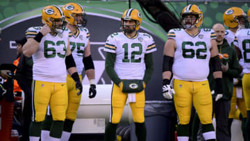 EAST RUTHERFORD, NEW JERSEY - DECEMBER 23: Aaron Rodgers #12 of the Green Bay Packers looks on from the sideline against the New York Jets at MetLife Stadium on December 23, 2018 in East Rutherford, New Jersey. (Photo by Steven Ryan/Getty Images)