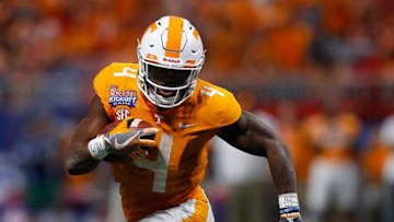 ATLANTA, GA - SEPTEMBER 04: John Kelly #4 of the Tennessee Volunteers rushes against the Georgia Tech Yellow Jackets at Mercedes-Benz Stadium on September 4, 2017 in Atlanta, Georgia. (Photo by Kevin C. Cox/Getty Images)