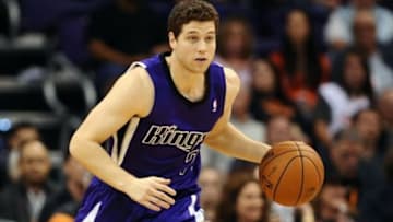 Nov 20, 2013; Phoenix, AZ, USA; Sacramento Kings guard Jimmer Fredette (7) dribbles the ball up the court in the second half of the game against the Phoenix Suns at US Airways Center. The Kings defeated the Suns 113-106. Mandatory Credit: Jennifer Stewart-USA TODAY Sports