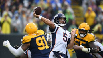 GREEN BAY, WISCONSIN - SEPTEMBER 22: Joe Flacco #5 of the Denver Broncos drops back to pass during the second half against the Green Bay Packers at Lambeau Field on September 22, 2019 in Green Bay, Wisconsin. (Photo by Stacy Revere/Getty Images)