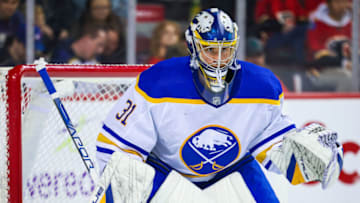 Oct 20, 2022; Calgary, Alberta, CAN; Buffalo Sabres goaltender Eric Comrie (31) guards his net against the Calgary Flames during the second period at Scotiabank Saddledome. Mandatory Credit: Sergei Belski-USA TODAY Sports