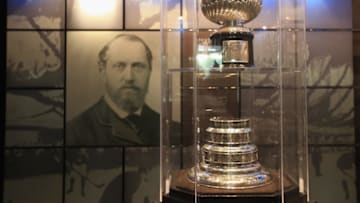 TORONTO, ON - NOVEMBER 12: The original Stanley Cup along with a portrait of Lord Stanley of Preston resides in a vault beside the Great Hall prior to the HHoF induction press conference and photo opportunity at the Hockey Hall of Fame on November 12, 2012 in Toronto, Canada. (Photo by Bruce Bennett/Getty Images)