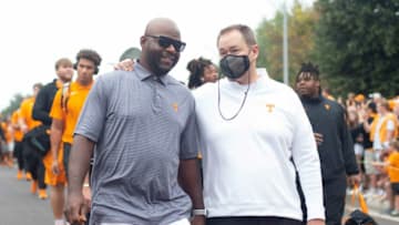 Tennessee Head Football Coach Josh Heupel walks with Al Wilson during the Vol Walk before the start of the NCAA college football game between the Tennessee Volunteers and the South Carolina Gamecocks in Knoxville, Tenn. on Saturday, October 9, 2021.Utvsc1007
