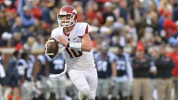 Arkansas Razorbacks quarterback Brandon Allen (10) scrambles during the second quarter of the game against the Mississippi Rebels at Vaught-Hemingway Stadium. Mandatory Credit: Matt Bush-USA TODAY Sports