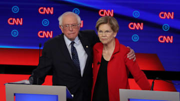 DETROIT, MICHIGAN - JULY 30: Democratic presidential candidate Sen. Bernie Sanders (I-VT) (L) and Sen. Elizabeth Warren (D-MA) embrace after the Democratic Presidential Debate at the Fox Theatre July 30, 2019 in Detroit, Michigan. 20 Democratic presidential candidates were split into two groups of 10 to take part in the debate sponsored by CNN held over two nights at Detroit’s Fox Theatre. (Photo by Justin Sullivan/Getty Images)