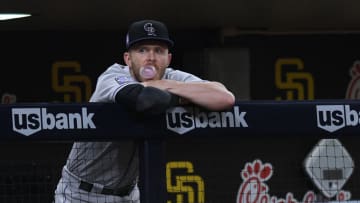 Jul 30, 2021; San Diego, California, USA; Colorado Rockies shortstop Trevor Story (27) looks on from the dugout during the seventh inning against the San Diego Padres at Petco Park. Mandatory Credit: Orlando Ramirez-USA TODAY Sports