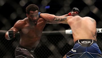 LAS VEGAS, NEVADA - DECEMBER 11: Geoff Neal (L) exchanges punches with Santiago Ponzinibbio of Argentina in their welterweight fight during the UFC 269 event at T-Mobile Arena on December 11, 2021 in Las Vegas, Nevada. (Photo by Carmen Mandato/Getty Images)