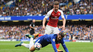 LONDON, ENGLAND - SEPTEMBER 17: Alvaro Morata of Chelsea and Shkodran Mustafi of Arsenal battle for possession during the Premier League match between Chelsea and Arsenal at Stamford Bridge on September 17, 2017 in London, England. (Photo by Mike Hewitt/Getty Images)