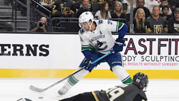 Brandon Sutter #20 of the Vancouver Canucks and Alex Tuch #89 of the Vegas Golden Knights (Photo by Ethan Miller/Getty Images)