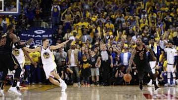 OAKLAND, CA - MAY 31: JR Smith #5 of the Cleveland Cavaliers dribbles in the closing seconds of regulation as LeBron James #23 attempts direct the offense against the Golden State Warriors in Game 1 of the 2018 NBA Finals at ORACLE Arena on May 31, 2018 in Oakland, California. NOTE TO USER: User expressly acknowledges and agrees that, by downloading and or using this photograph, User is consenting to the terms and conditions of the Getty Images License Agreement. (Photo by Ezra Shaw/Getty Images)