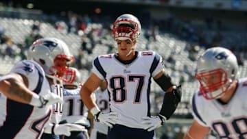 Oct 20, 2013; East Rutherford, NJ, USA; New England Patriots tight end Rob Gronkowski (87) warms up before their game against the New York Jets at MetLife Stadium. Mandatory Credit: Ed Mulholland-USA TODAY Sports