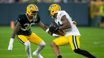 Green Bay Packers wide receiver Reggie Begelton (84) runs the ball against defensive back Vernon Scott (36) during Packers Family Night at Lambeau Field, Saturday, Aug. 7, 2021, in Green Bay, Wis. Samantha Madar/USA TODAY NETWORK-WisconsinGpg Packersfamilynight 08072021 0039