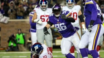 Dec 27, 2015; Minneapolis, MN, USA; Minnesota Vikings defensive end Brian Robison (96) celebrates a sack of New York Giants quarterback Eli Manning (10) during the second quarter at TCF Bank Stadium. Mandatory Credit: Brace Hemmelgarn-USA TODAY Sports