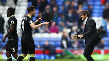 LIVERPOOL, ENGLAND - APRIL 30: Antonio Conte, Manager of Chelsea and Cesc Fabregas of Chelsea celebrate after the Premier League match between Everton and Chelsea at Goodison Park on April 30, 2017 in Liverpool, England. (Photo by Clive Brunskill/Getty Images)