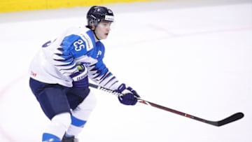 VANCOUVER , BC - JANUARY 4: Aarne Talvitie #25 of Finland skates against Switzerland during a semi-final game at the IIHF World Junior Championships at Rogers Arena on January 4, 2019 in Vancouver, British Columbia, Canada. (Photo by Kevin Light/Getty Images) "n"n"n"n