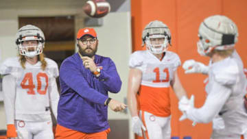 Thomas Austin, offensive analyst for Clemson football, works with tight ends during practice at the Poe Indoor Facility in Clemson in Clemson, S.C. Saturday, December 18, 2021.Clemson Football Practice Dec 18 Saturday