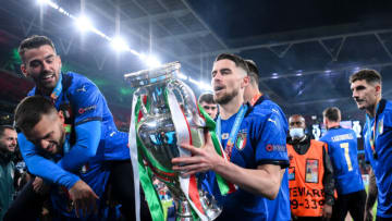 LONDON, ENGLAND - JULY 11: Jorginho of Italy celebrates with The Henri Delaunay Trophy following his team's victory in the UEFA Euro 2020 Championship Final between Italy and England at Wembley Stadium on July 11, 2021 in London, England. (Photo by Laurence Griffiths/Getty Images)